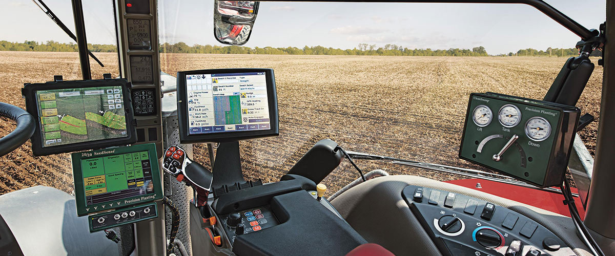 Climate Fieldview monitors in the cab of a tractor