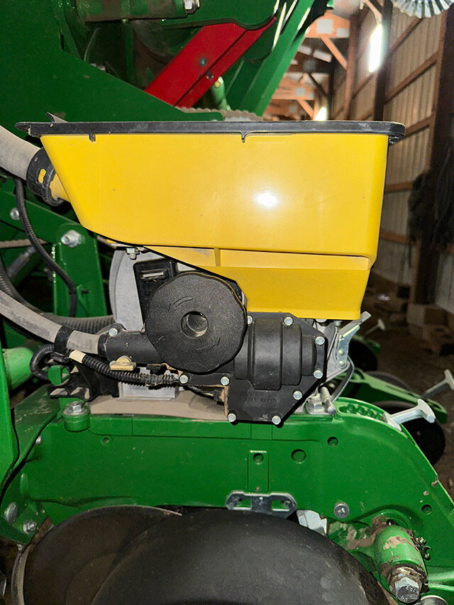 side view 2 of a row unit on the John Deere 17 95 N T planter