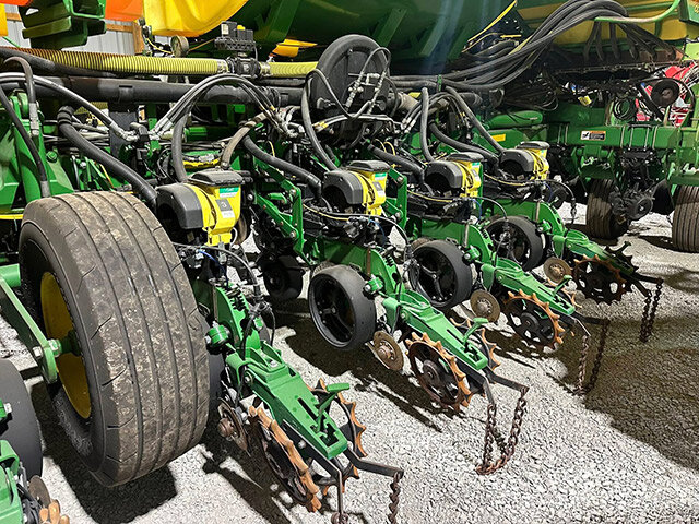 side view 2 of row units on a John Deere 17 70 N T planter 