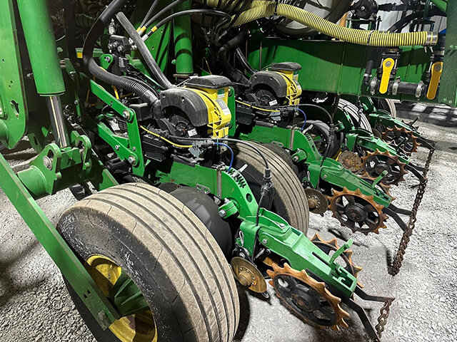 side view 1 of row units on a John Deere 17 70 N T planter
