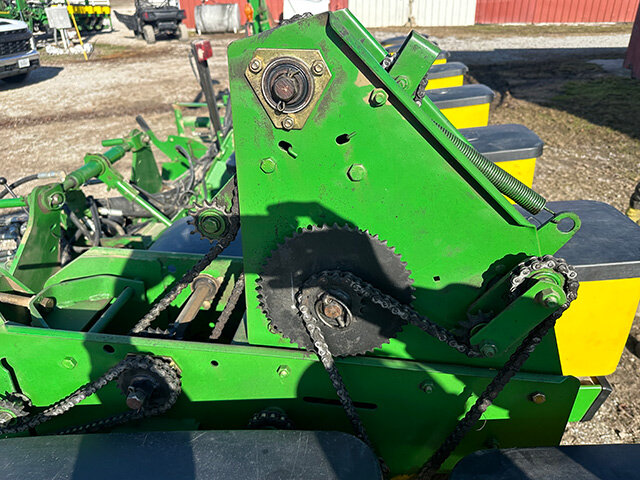 view 1 of some sprockets and chains on the 2008 John Deere 17 60 12 row 30 inch planter