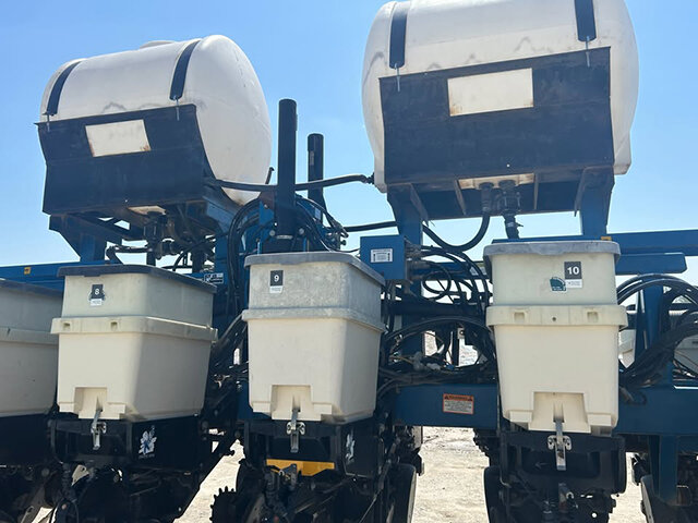 view of 2 In Furrow tanks on the Kinze 16 32 planter