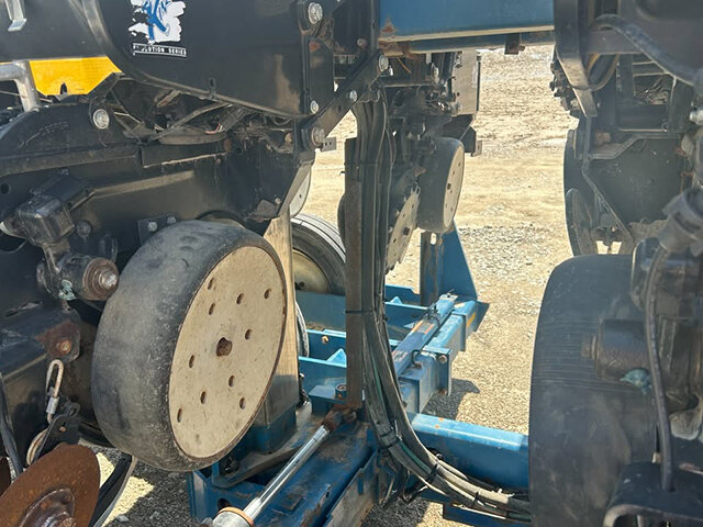 side view of a row unit on the Kinze 16 32 planter